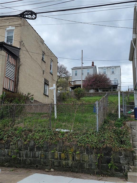 311 Natchez Street Pittsburgh, PA 15211 - Photo 2 of 12 a view of a back yard of the house