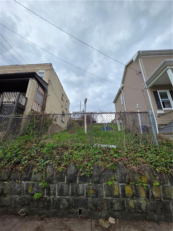 311 Natchez Street Pittsburgh, PA 15211 - Photo 10 of 12 a backyard of a house with lots of green space