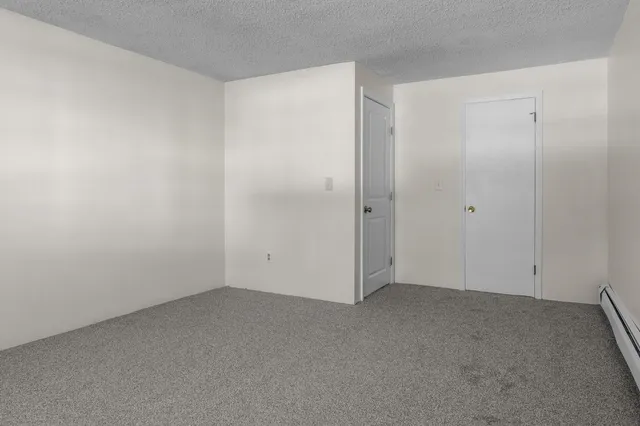 $189,900 | 12 English Village Road, Unit 201, Manchester, NH 03102