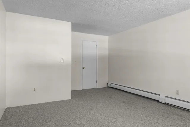 $189,900 | 12 English Village Road, Unit 201, Manchester, NH 03102