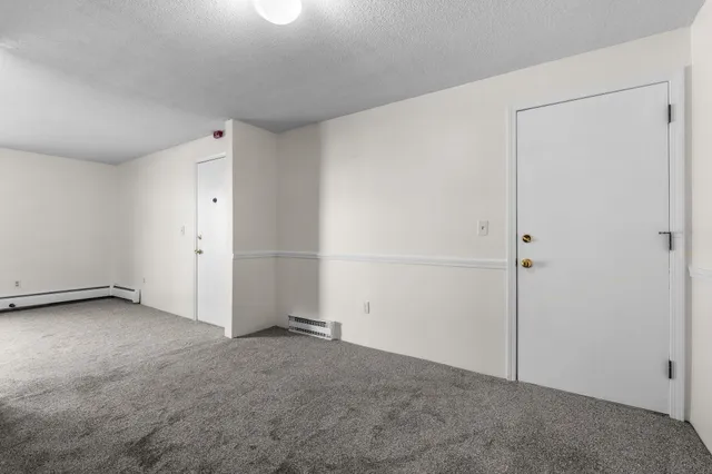 $189,900 | 12 English Village Road, Unit 201, Manchester, NH 03102