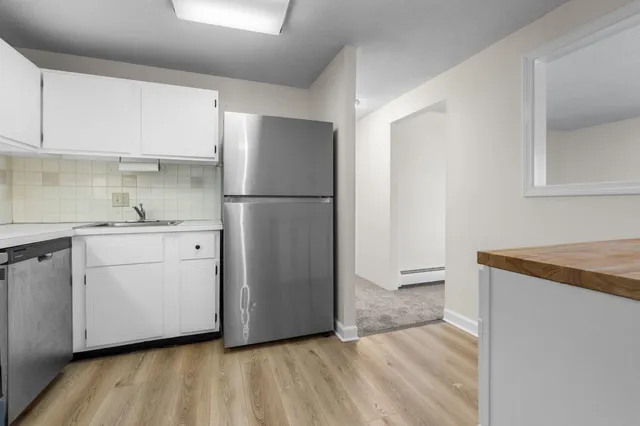 $189,900 | 12 English Village Road, Unit 201, Manchester, NH 03102