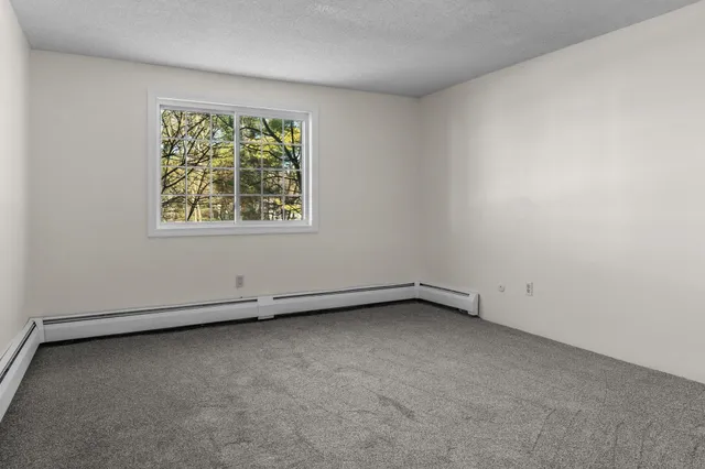 $189,900 | 12 English Village Road, Unit 201, Manchester, NH 03102