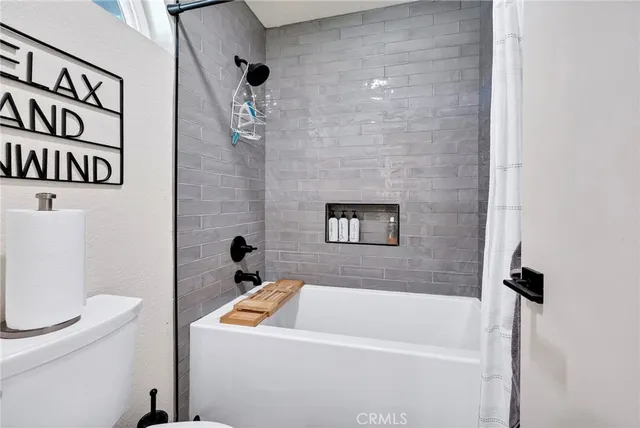 a bathroom with a sink and a bathtub