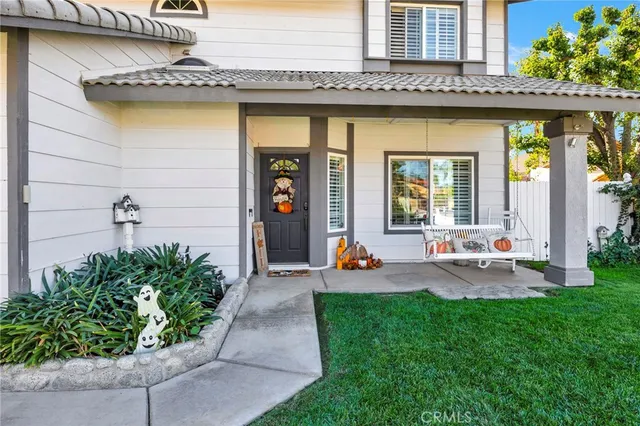 a front view of a house with patio