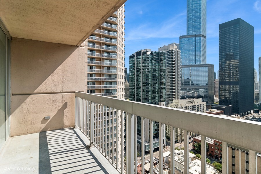 545 North Dearborn Street, Unit 1809 Chicago, IL 60654 - Photo 12 of 31 a view of balcony with wooden floor and fence