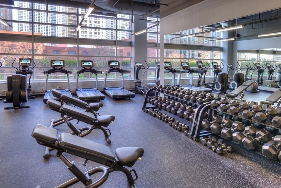 545 North Dearborn Street, Unit 1809 Chicago, IL 60654 - Photo 20 of 31 a view of a room with gym equipment