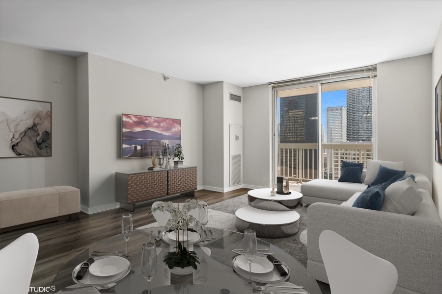 545 North Dearborn Street, Unit 1809 Chicago, IL 60654 - Photo 6 of 31 a living room with furniture and a large window
