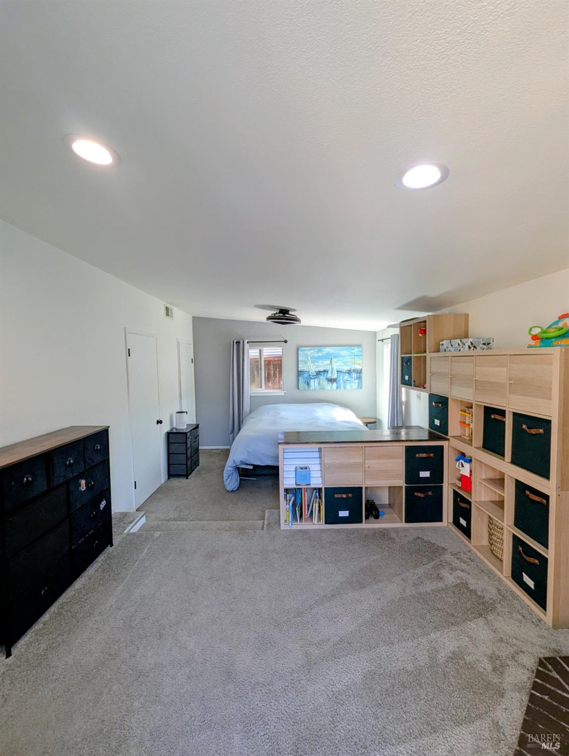 112 East Agua Caliente Road Sonoma, CA 95476 - Photo 15 of 20 a living room with furniture and a flat screen tv