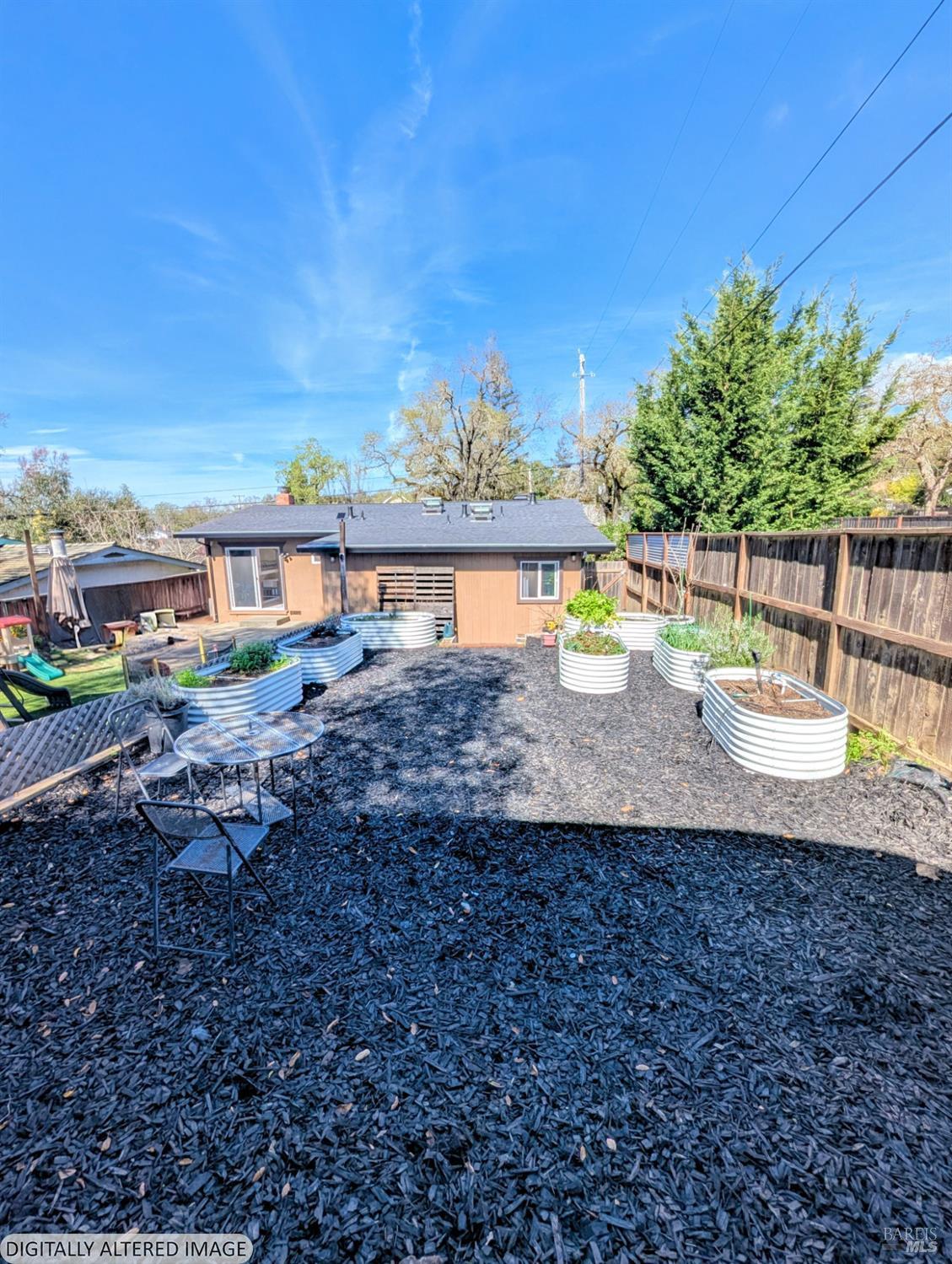 112 East Agua Caliente Road Sonoma, CA 95476 - Photo 20 of 20 a view of a house with a yard and sitting area