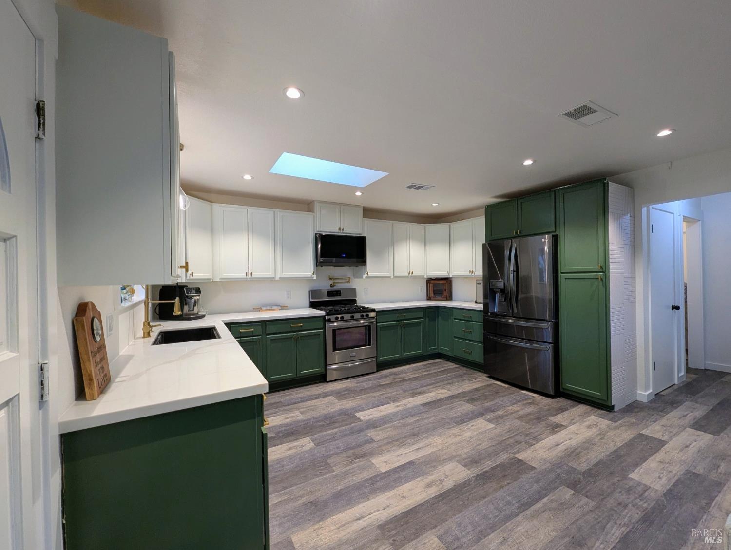 112 East Agua Caliente Road Sonoma, CA 95476 - Photo 6 of 20 a kitchen with granite countertop a refrigerator stove top oven and sink