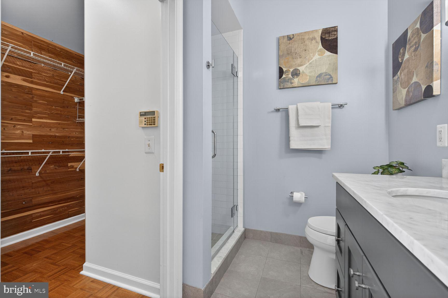 1343 Argall Place Alexandria, VA 22314 - Photo 16 of 35 Primary bathroom and walk-in cedar closet