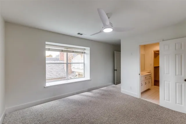 a bathroom with a shower and a toilet