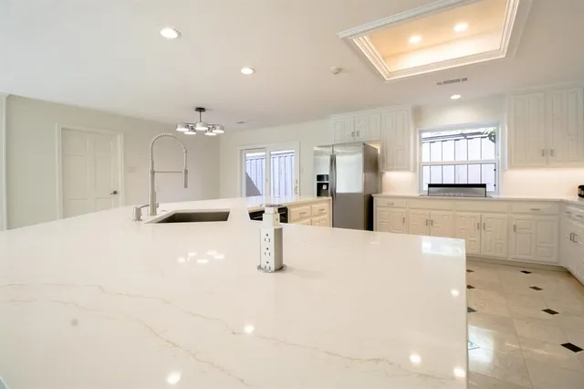 a bathroom with a bathtub and shower