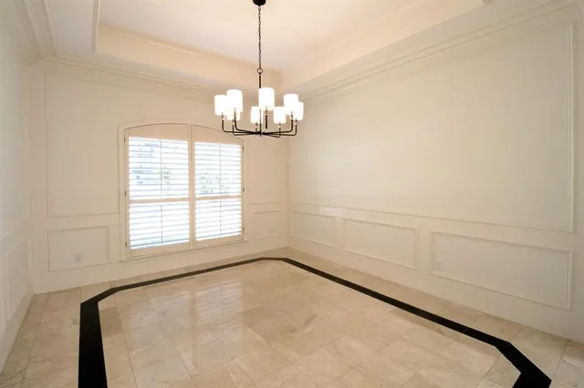 a spacious bathroom with a double vanity sink a mirror and a shower