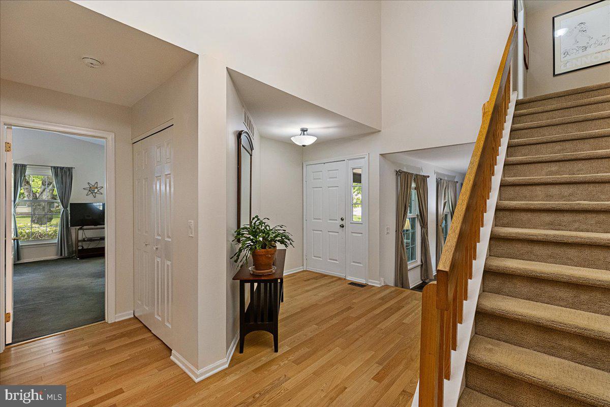 3 Strathmore Place Princeton Junction, NJ 08550 - Photo 5 of 29 a view of entryway with livingroom and wooden floor