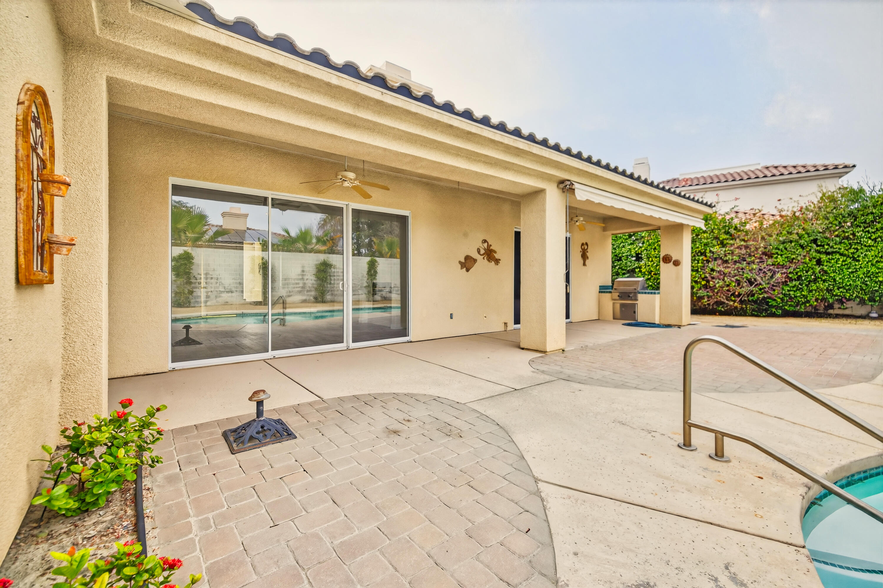 6 Queens Court Rancho Mirage, CA 92270 - Photo 6 of 28 a view of a house with a swimming pool