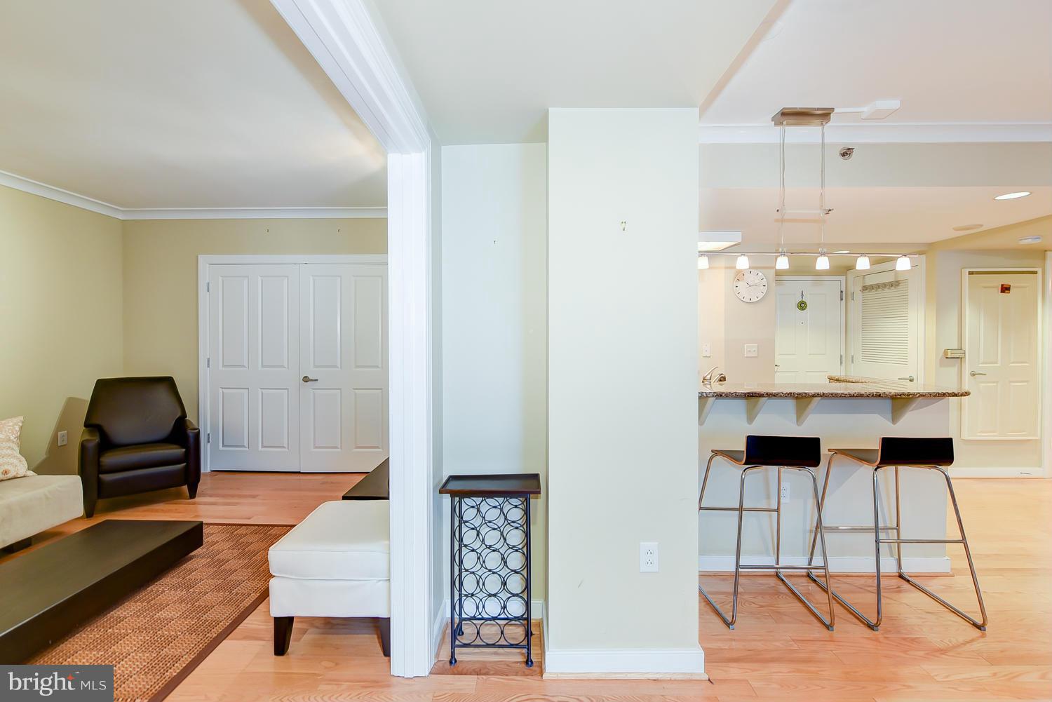 777 7th Street Northwest, Unit 1113 Washington, DC 20001 - Photo 11 of 30 a living room with furniture