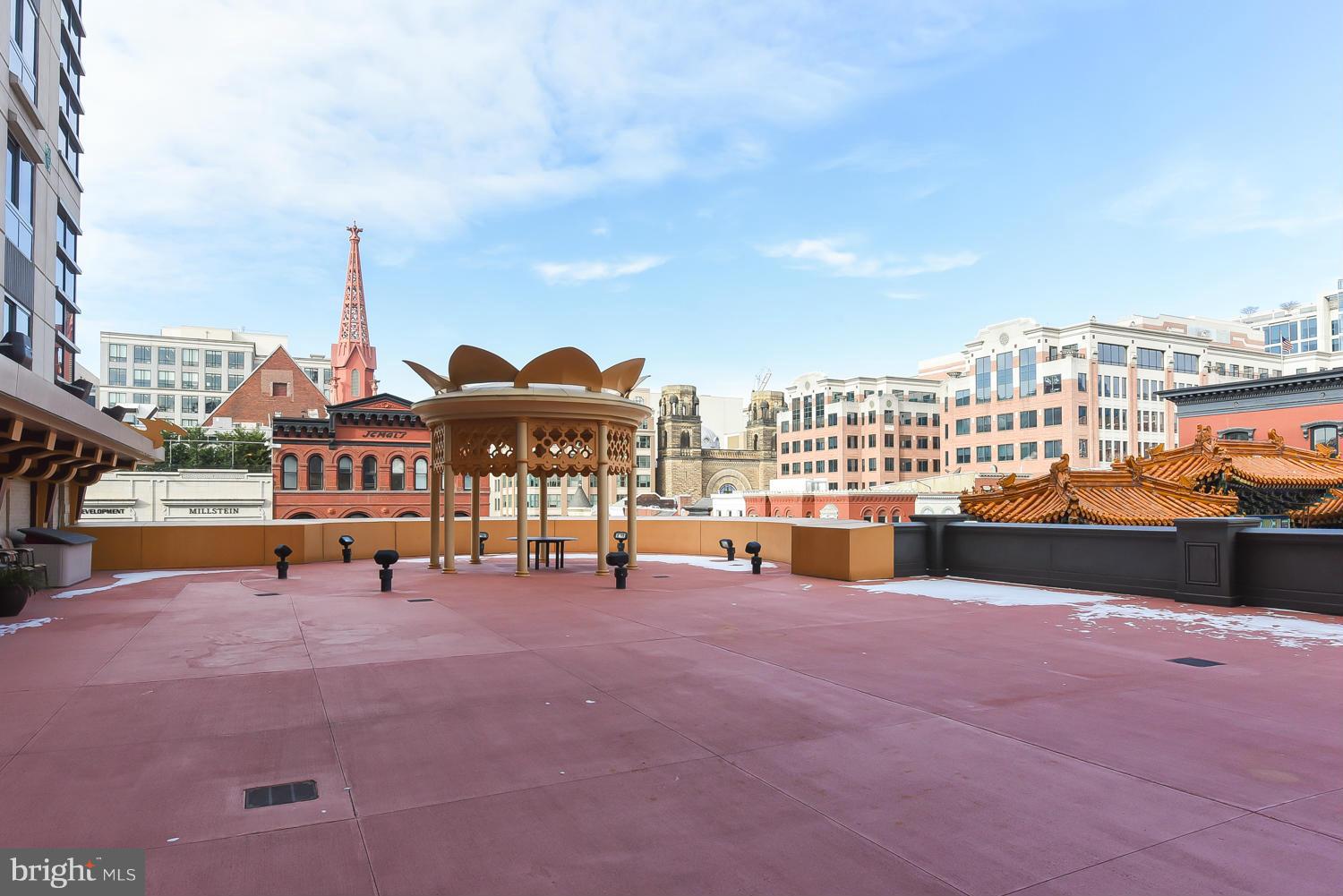 777 7th Street Northwest, Unit 1113 Washington, DC 20001 - Photo 26 of 30 a view of a terrace with seating area