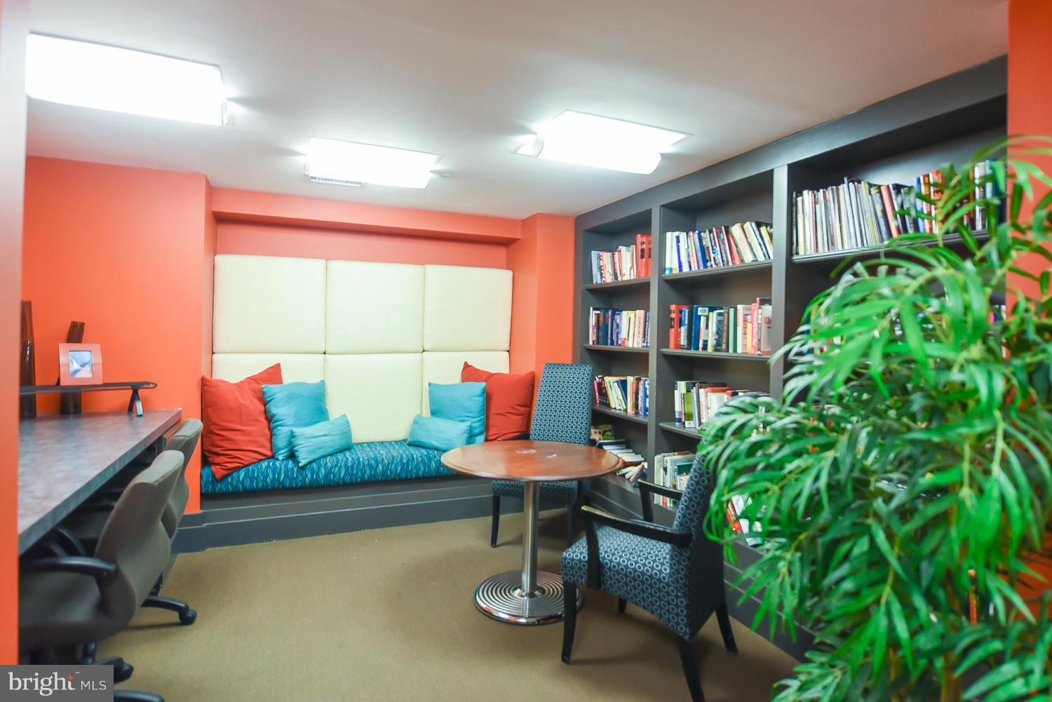 777 7th Street Northwest, Unit 1113 Washington, DC 20001 - Photo 28 of 30 a living room with furniture and a potted plant