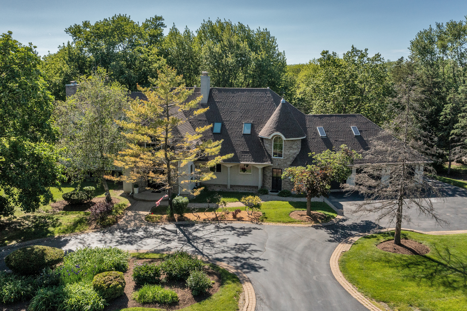144 North Highland Road Inverness, IL 60067 - Photo 45 of 49 an aerial view of a house with a yard basket ball court and outdoor seating