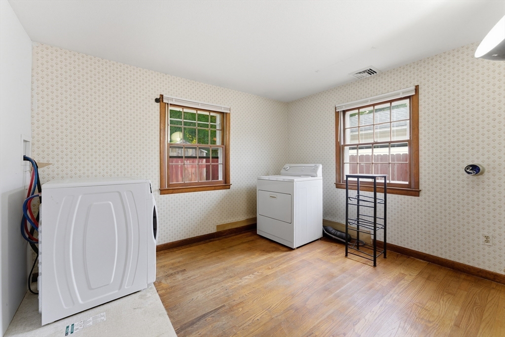 193 Roy Street Springfield, MA 01104 - Photo 25 of 40 a view of a room with window and wooden floor