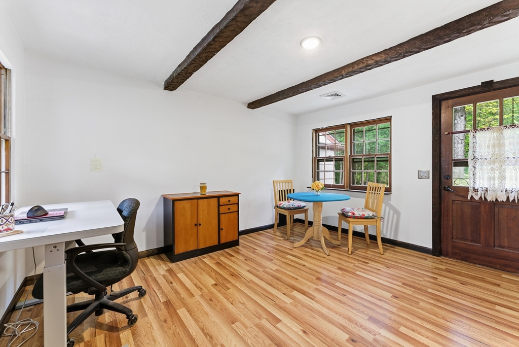 193 Roy Street Springfield, MA 01104 - Photo 31 of 40 a workspace room with furniture and wooden floor