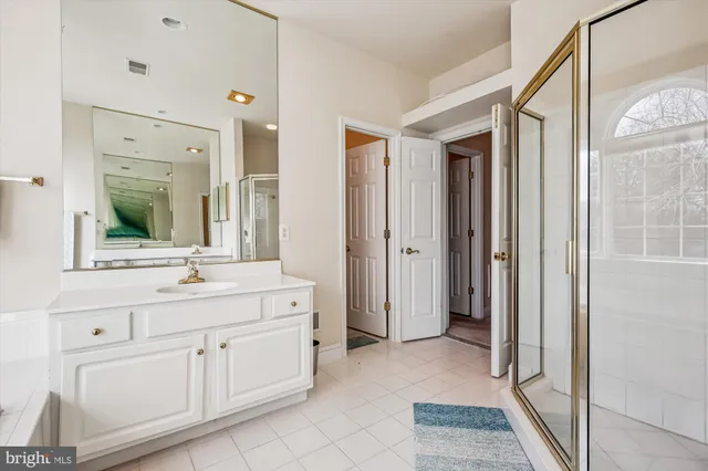 a picture of a bathroom with a shower