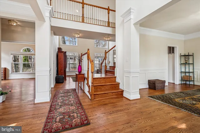 a bathroom with a sink mirror toilet and shower