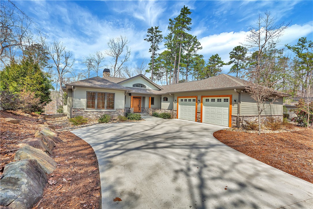 10 Admiral Lane Salem, SC 29676 - Photo 1 of 43 This charming home features a paved driveway and an attached two-car garage, nestled among mature trees.