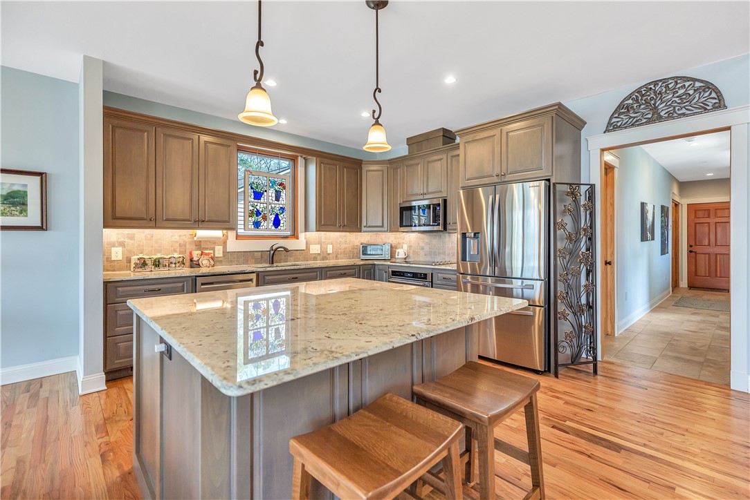 10 Admiral Lane Salem, SC 29676 - Photo 13 of 43 This spacious kitchen offers a large island with ample counter space and modern appliances.