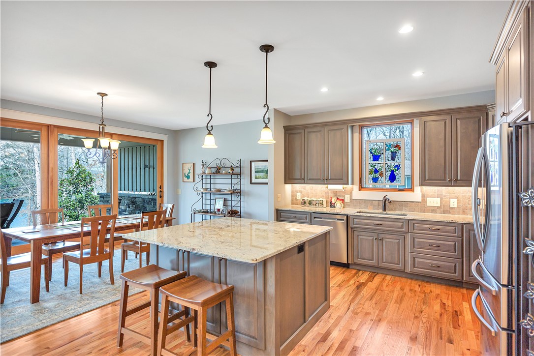 10 Admiral Lane Salem, SC 29676 - Photo 15 of 43 This inviting kitchen and dining area offers ample space for cooking and entertaining.