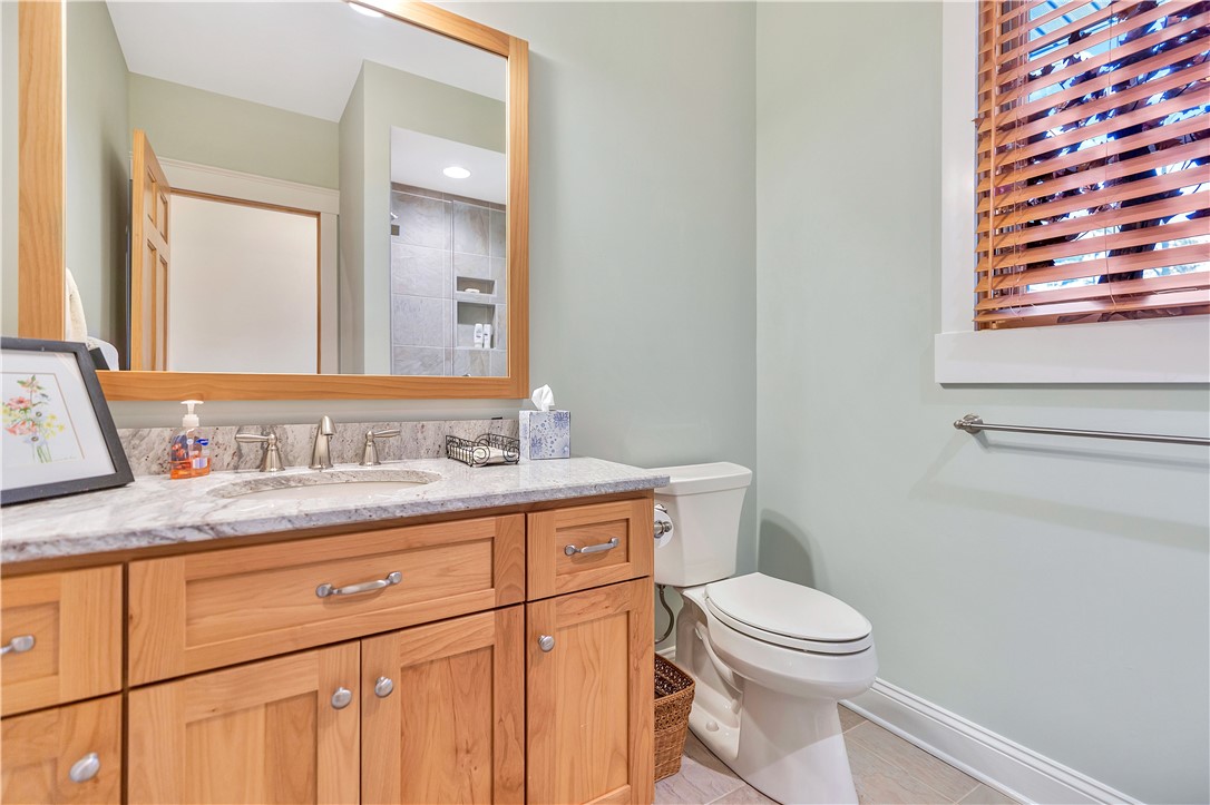 10 Admiral Lane Salem, SC 29676 - Photo 26 of 43 This bright bathroom features a vanity with granite counters and tiled flooring.