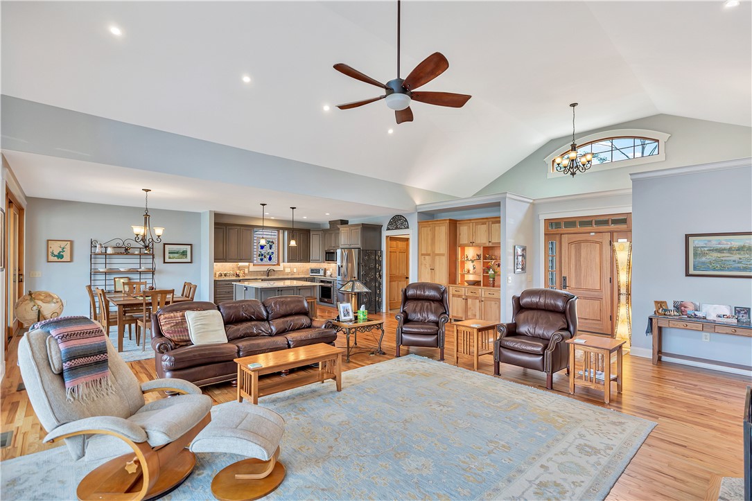 10 Admiral Lane Salem, SC 29676 - Photo 7 of 43 This expansive living area offers seamless flow between living, dining, and kitchen spaces.