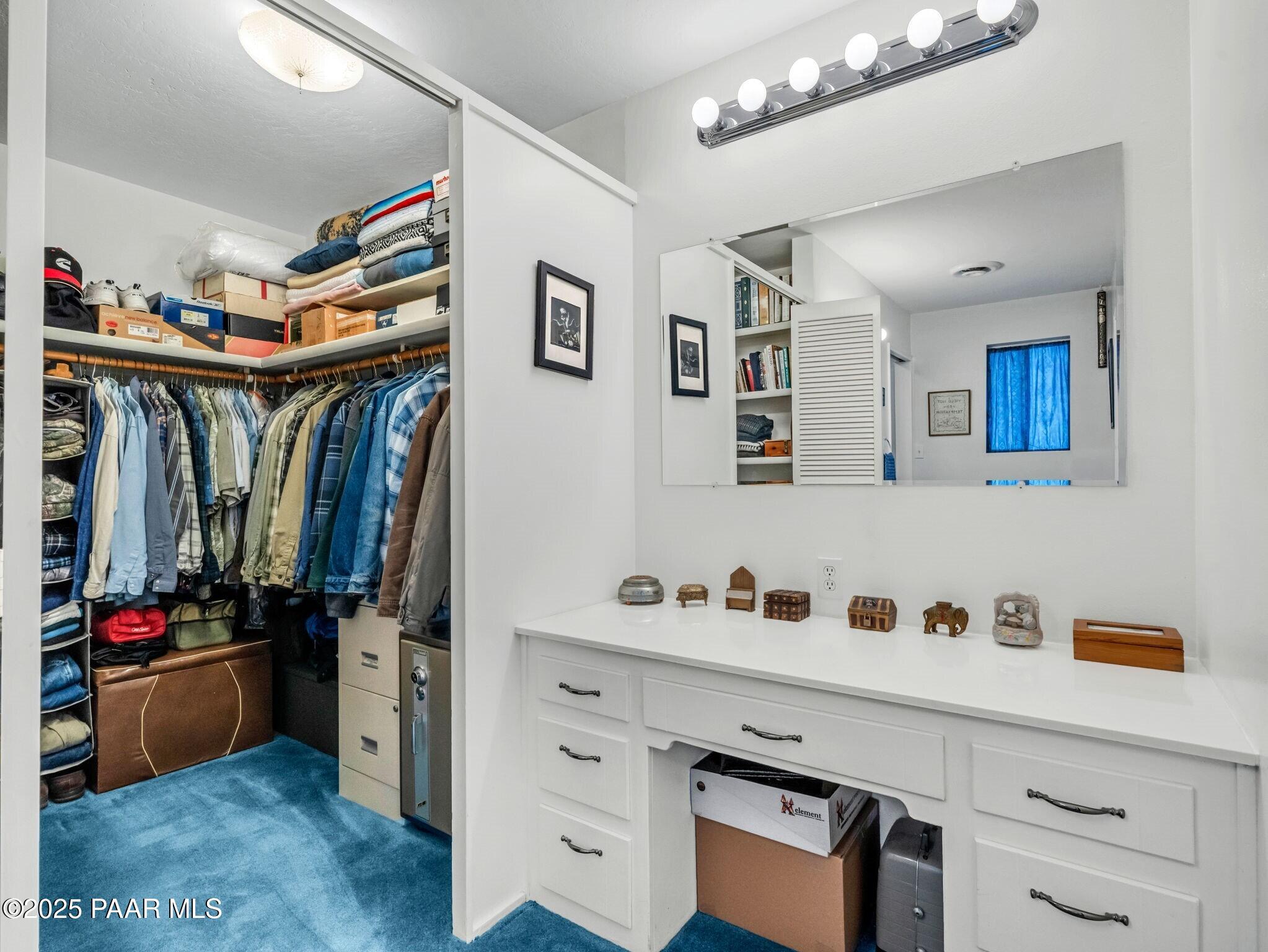 2710 Ridge Road Prescott, AZ 86301 - Photo 19 of 32 a view of walk in closet with clothes and shoes