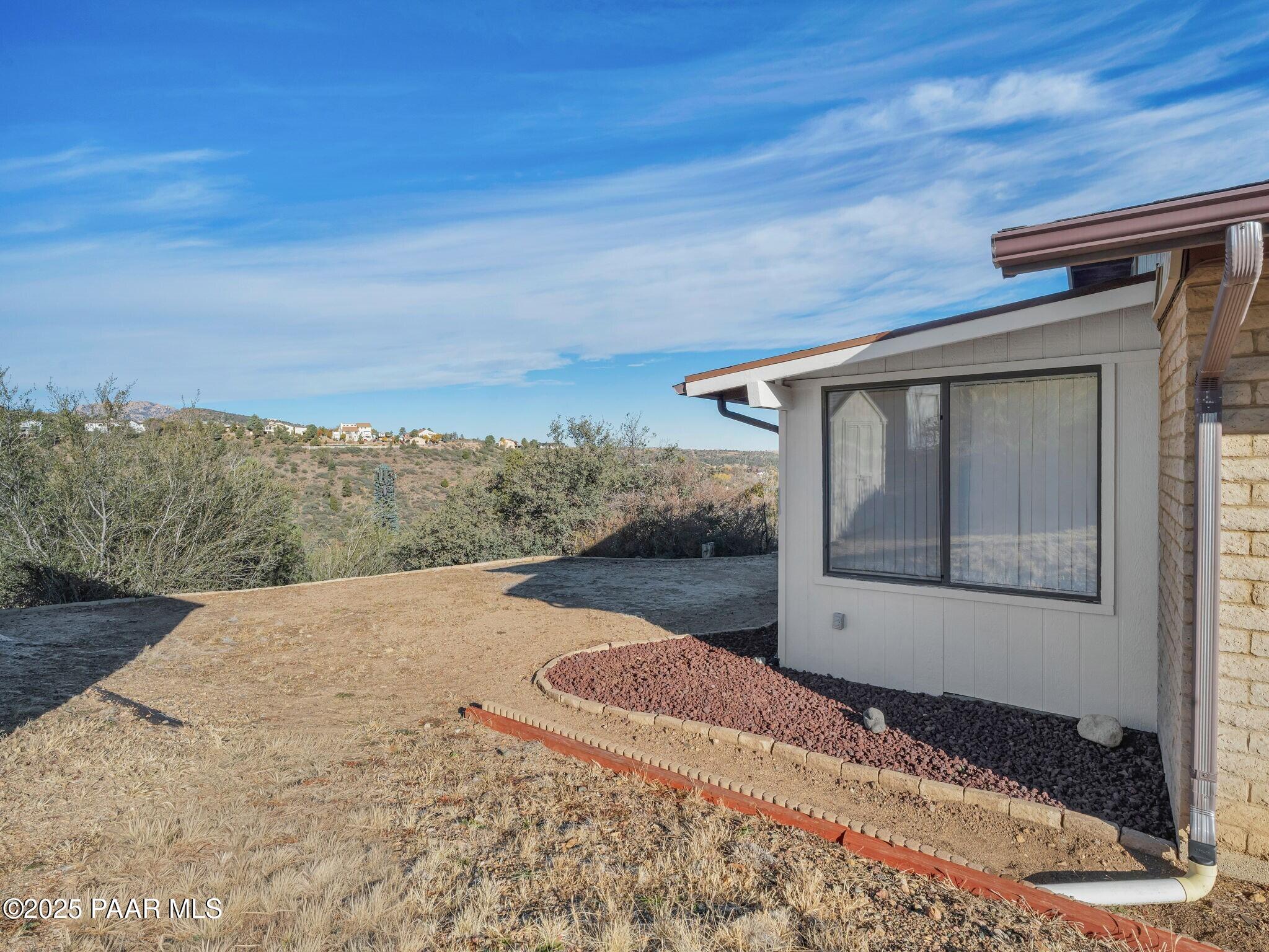 2710 Ridge Road Prescott, AZ 86301 - Photo 27 of 32 a view of a house with a yard