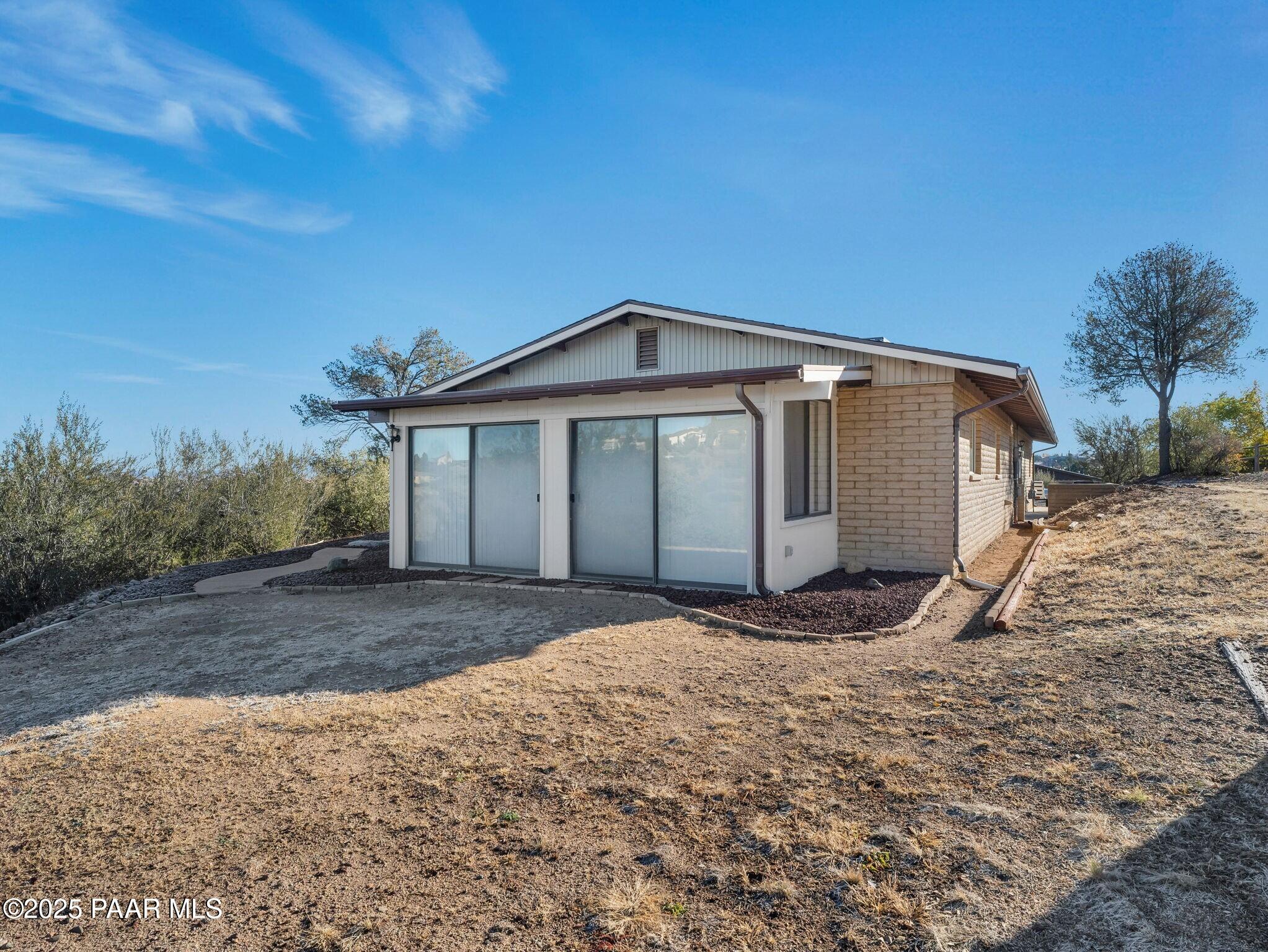 2710 Ridge Road Prescott, AZ 86301 - Photo 29 of 32 a front view of a house with a yard
