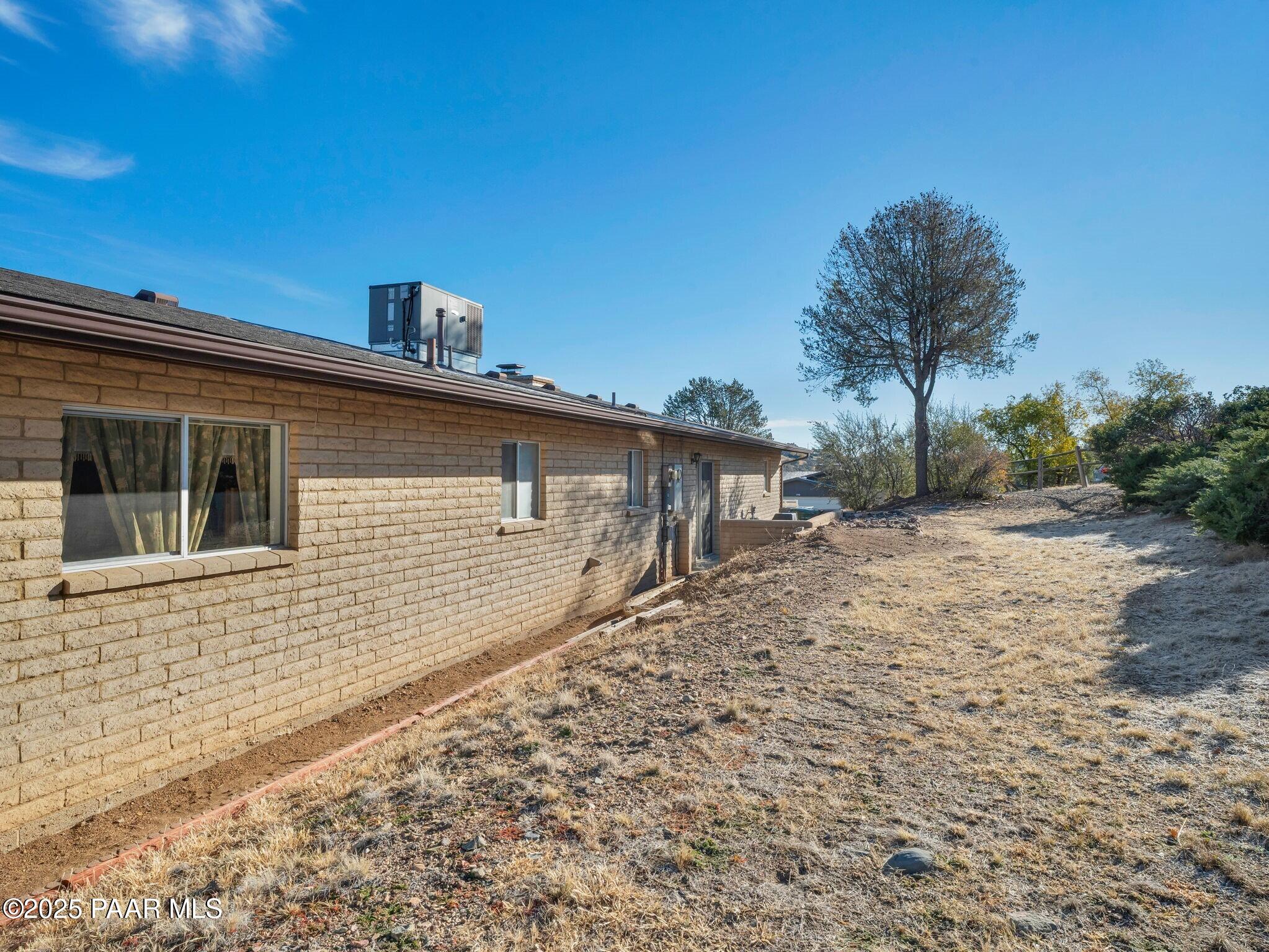 2710 Ridge Road Prescott, AZ 86301 - Photo 30 of 32 a front view of a house with a yard