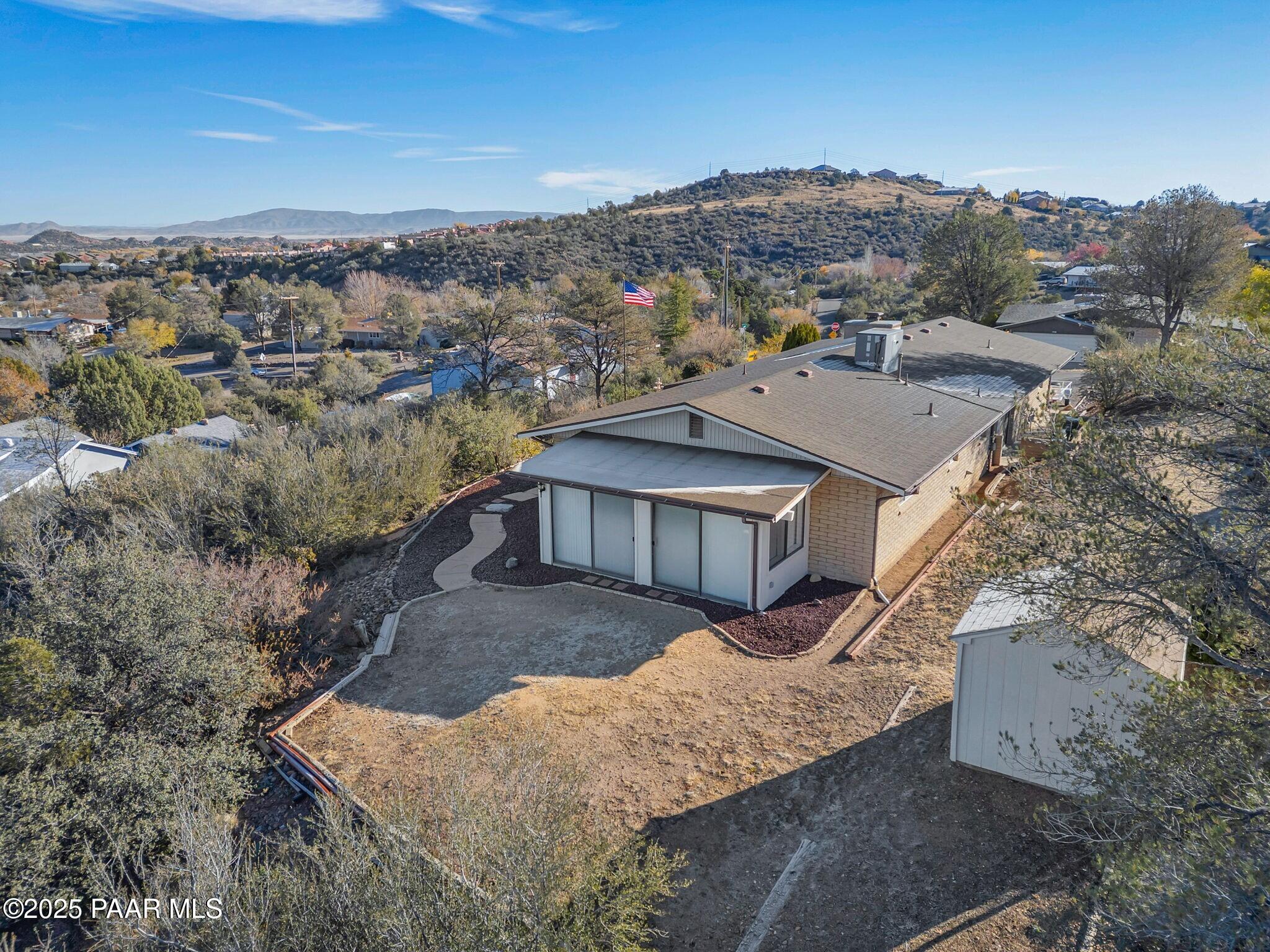 2710 Ridge Road Prescott, AZ 86301 - Photo 4 of 32 a view of a house with a mountain