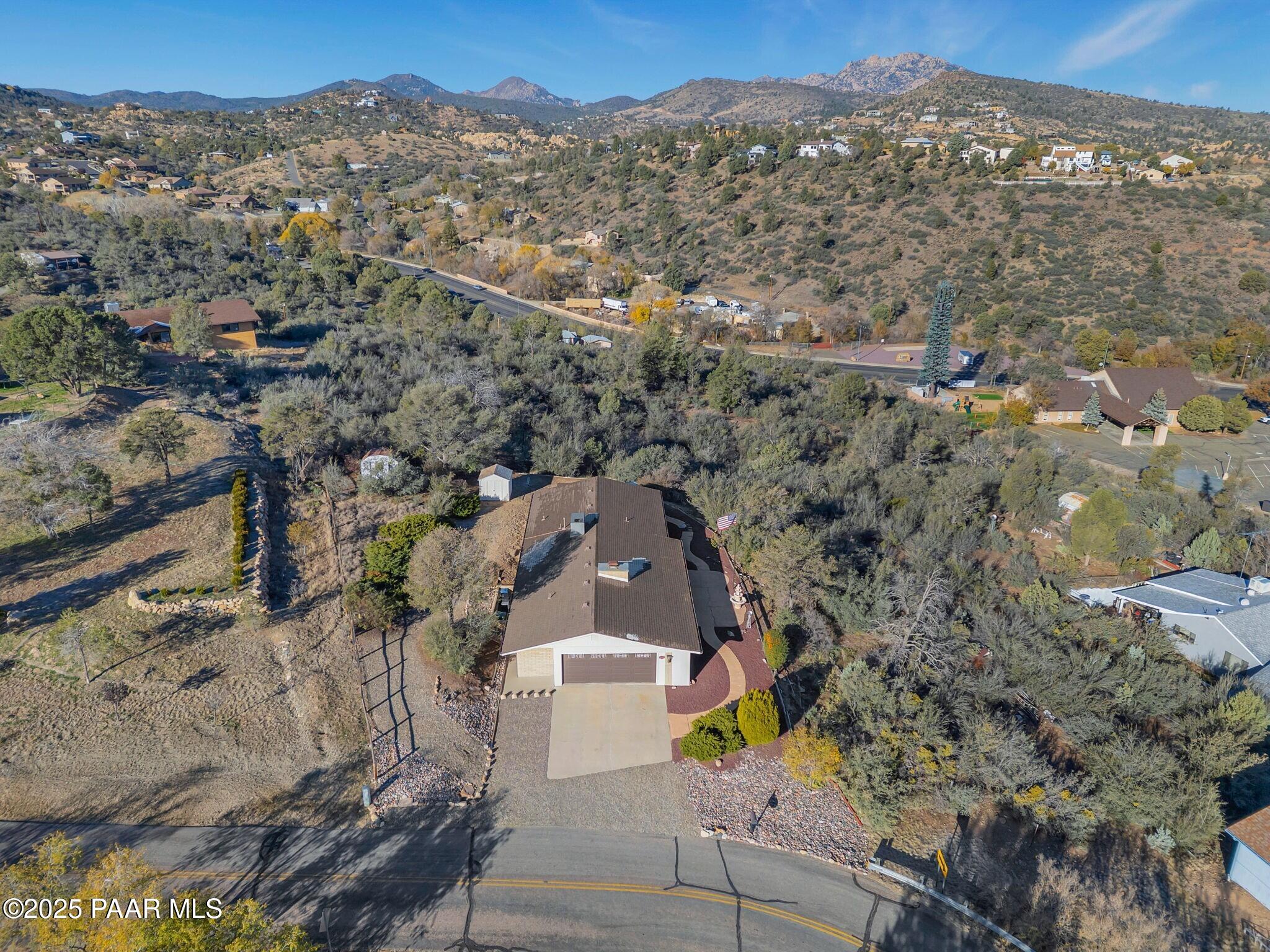 2710 Ridge Road Prescott, AZ 86301 - Photo 6 of 32 an aerial view of a house with a mountain