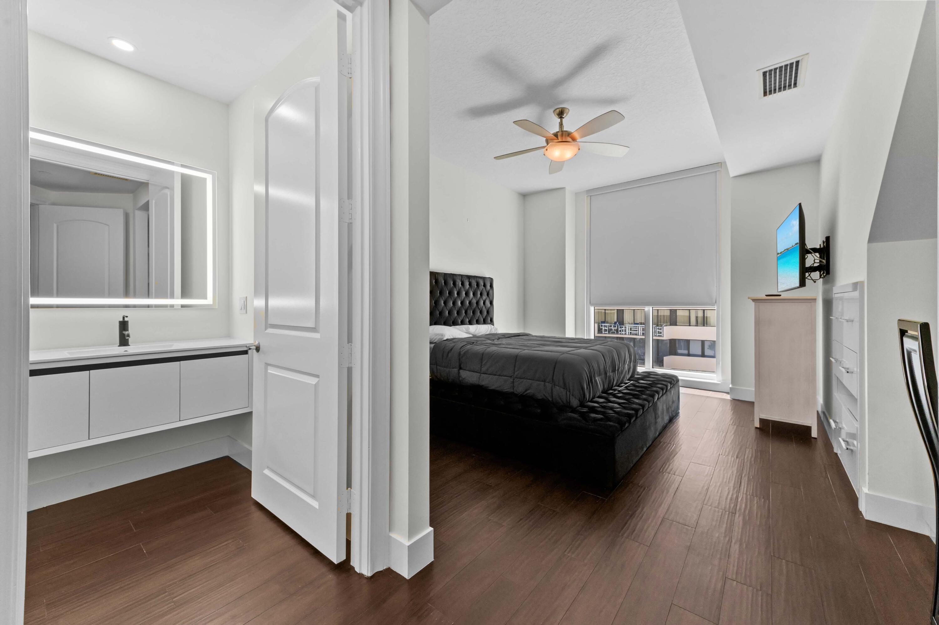 4600 North Ocean Drive, Unit 605 Riviera Beach, FL 33404 - Photo 27 of 65 a bedroom with furniture and a window