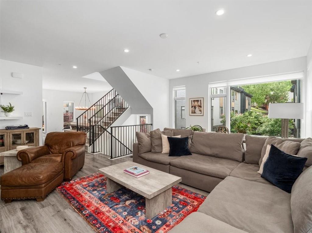 5557 Berlin Way Pittsburgh, PA 15201 - Photo 17 of 34 a living room with furniture and a wooden floor