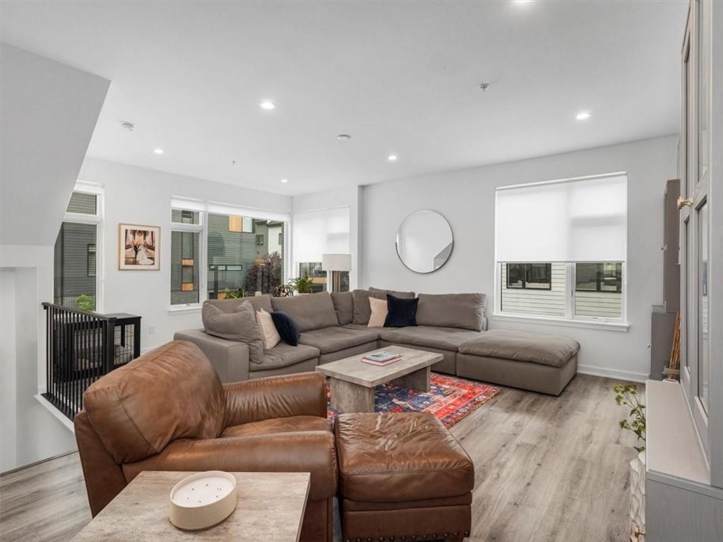 5557 Berlin Way Pittsburgh, PA 15201 - Photo 18 of 34 a living room with furniture and a fireplace
