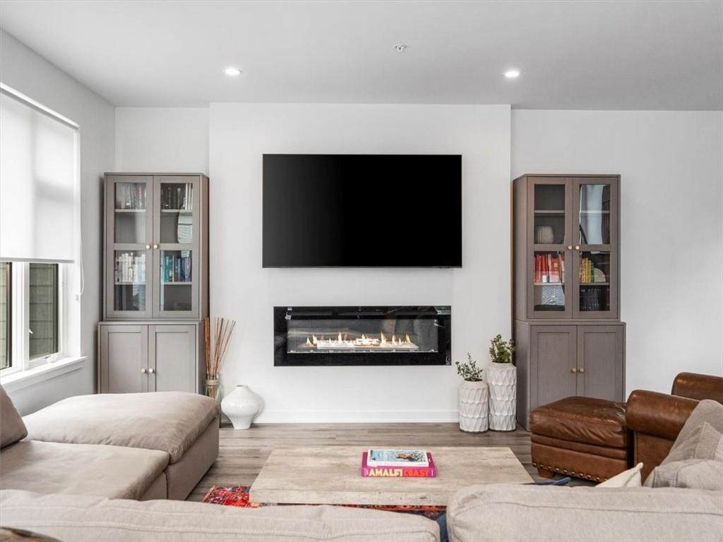 5557 Berlin Way Pittsburgh, PA 15201 - Photo 21 of 34 a living room with furniture and a flat screen tv