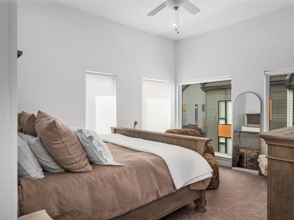 5557 Berlin Way Pittsburgh, PA 15201 - Photo 24 of 34 a bedroom with a bed and a large window