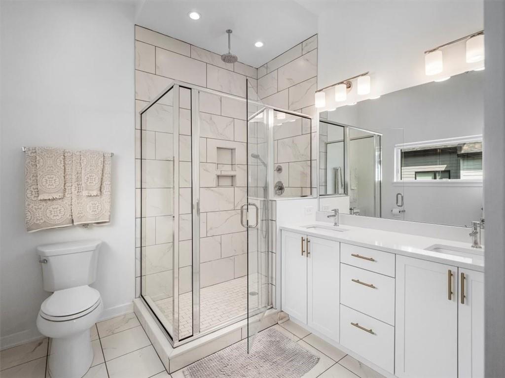 5557 Berlin Way Pittsburgh, PA 15201 - Photo 25 of 34 a bathroom with a shower toilet sink and mirror