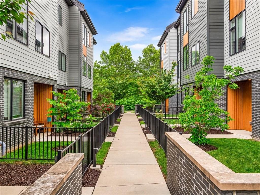 5557 Berlin Way Pittsburgh, PA 15201 - Photo 4 of 34 a view of a house with brick walls