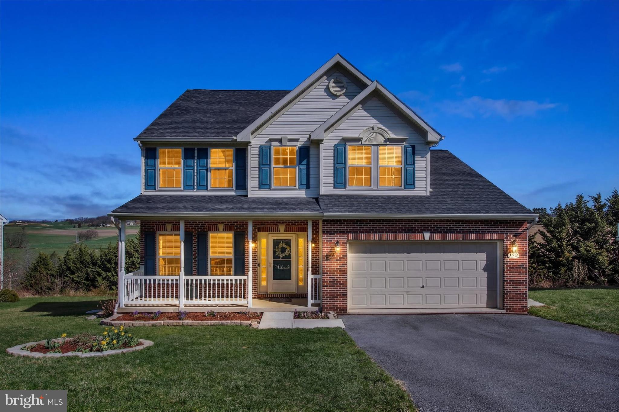 123 Colton Court Smithsburg, MD 21783 - Photo 1 of 60 a front view of a house with a yard and garage