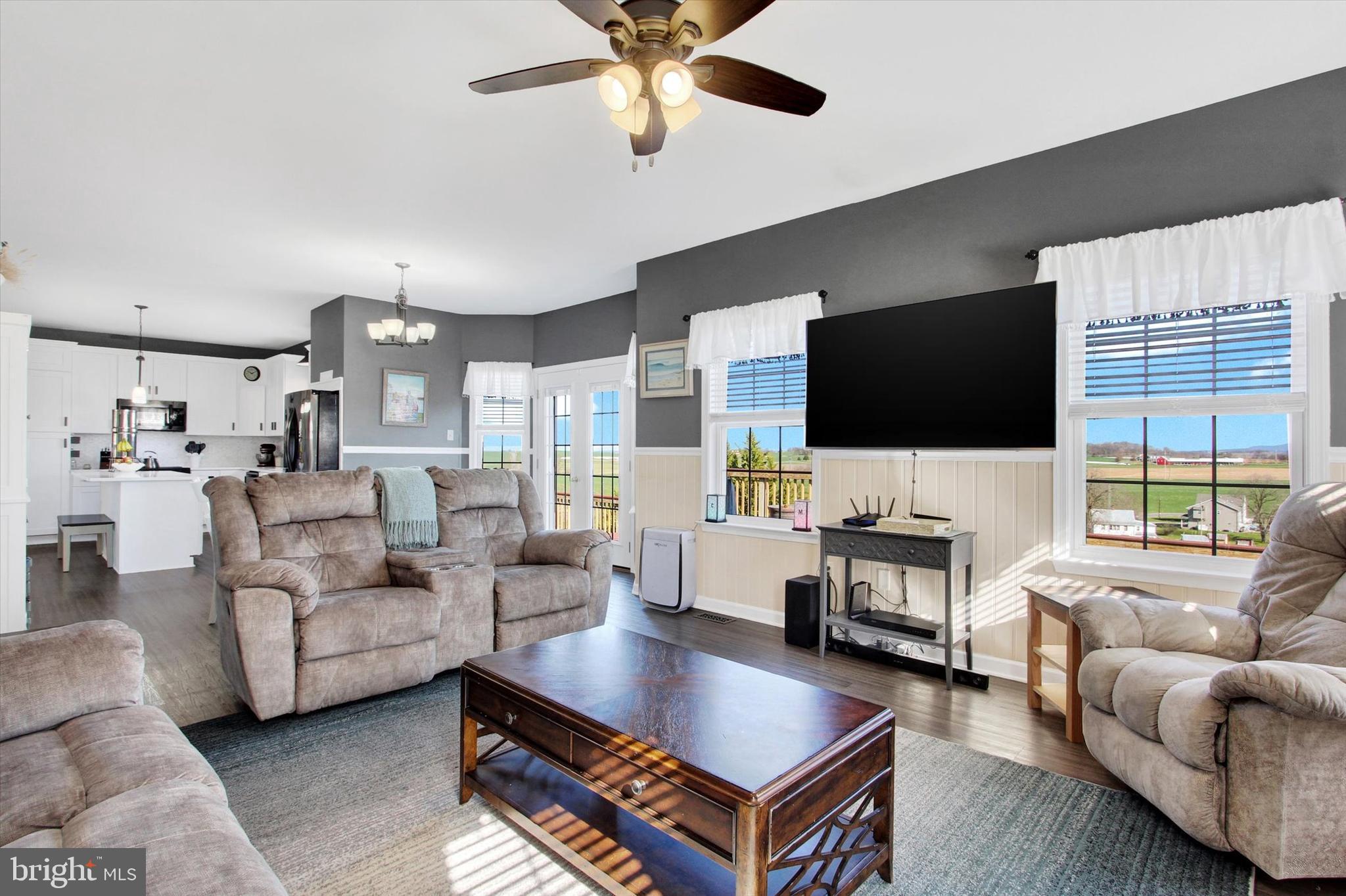 123 Colton Court Smithsburg, MD 21783 - Photo 22 of 60 a living room with furniture and a flat screen tv