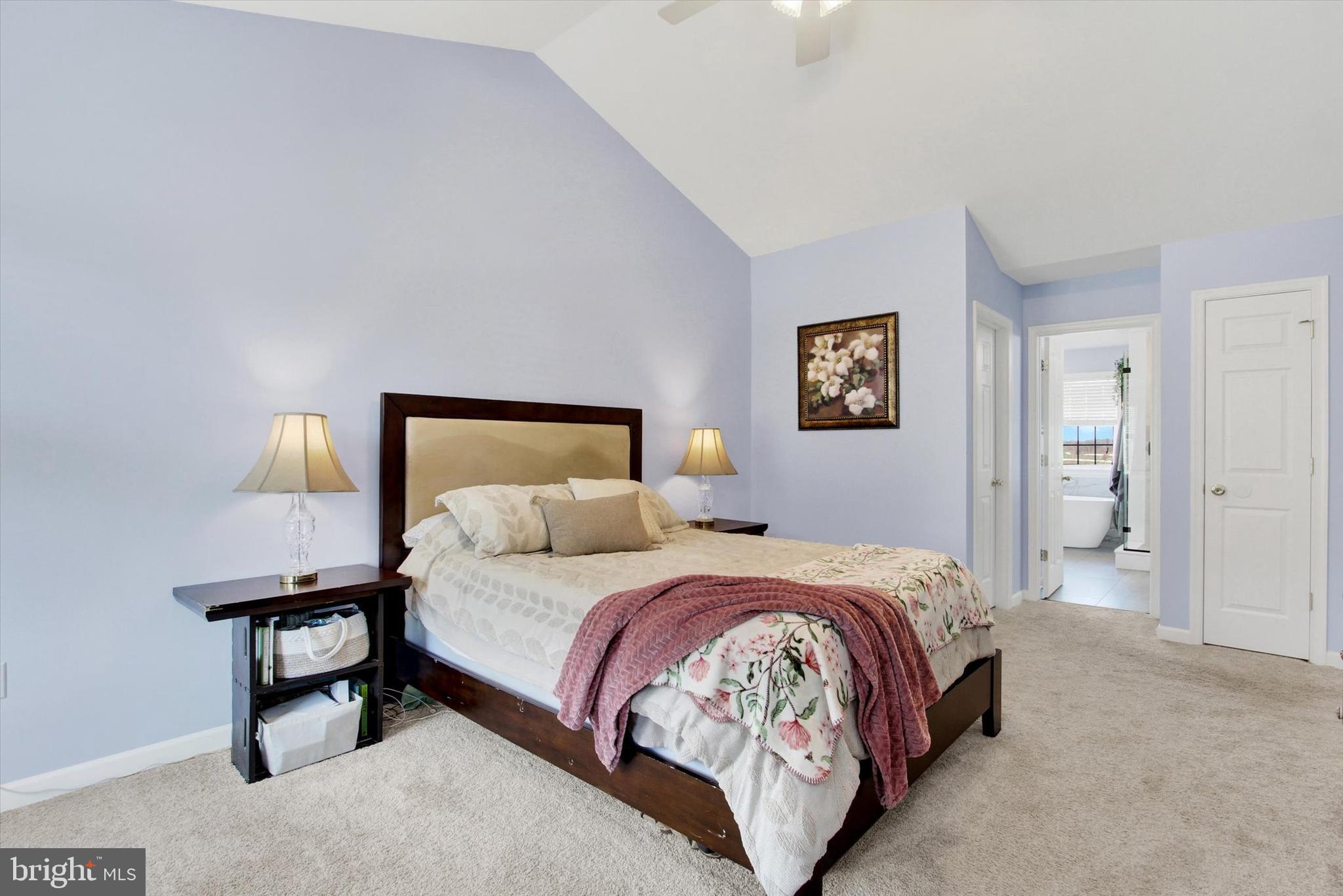 123 Colton Court Smithsburg, MD 21783 - Photo 27 of 60 a bedroom with a bed and a lamp